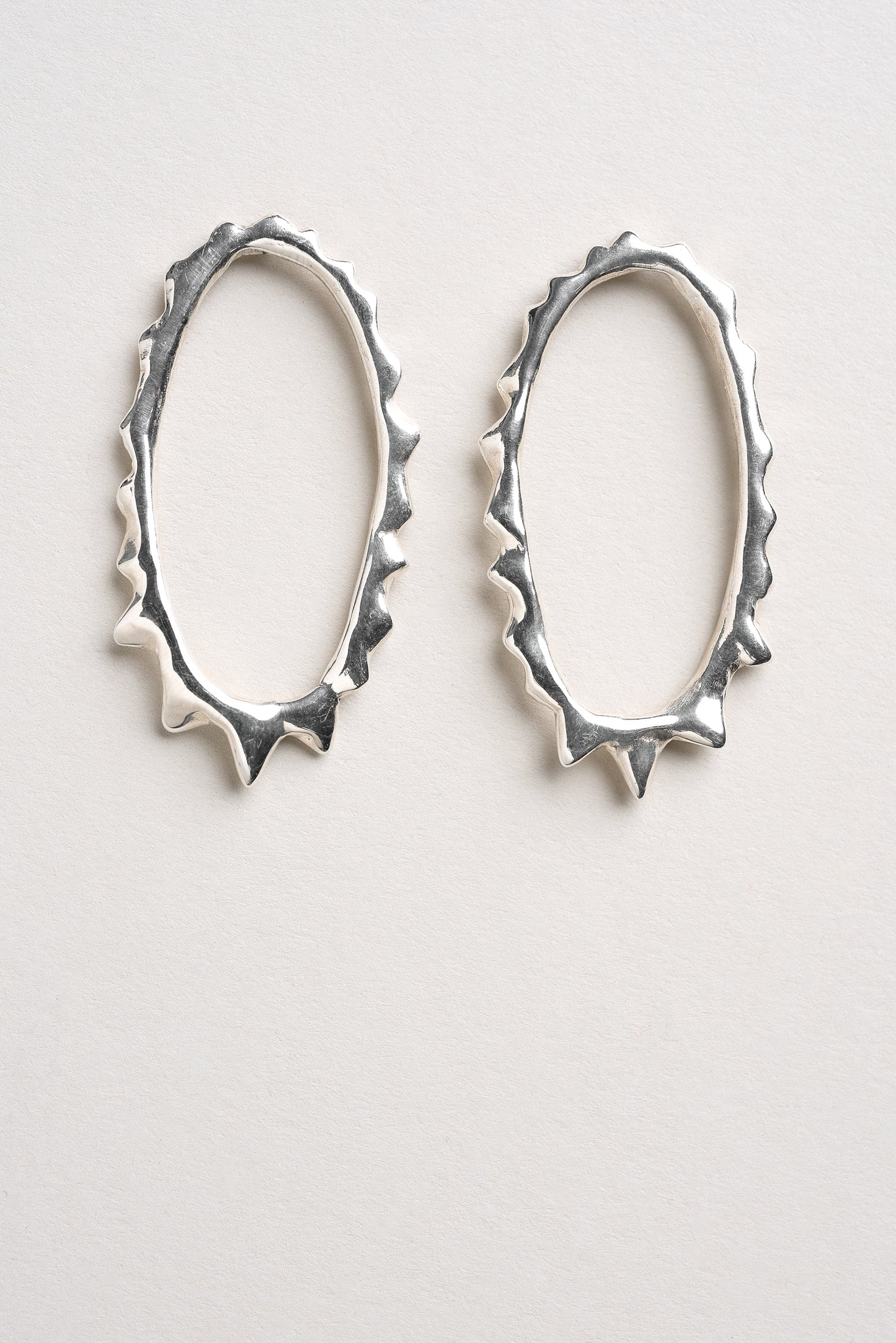 Boucles d'oreilles Éclipse distorsionée